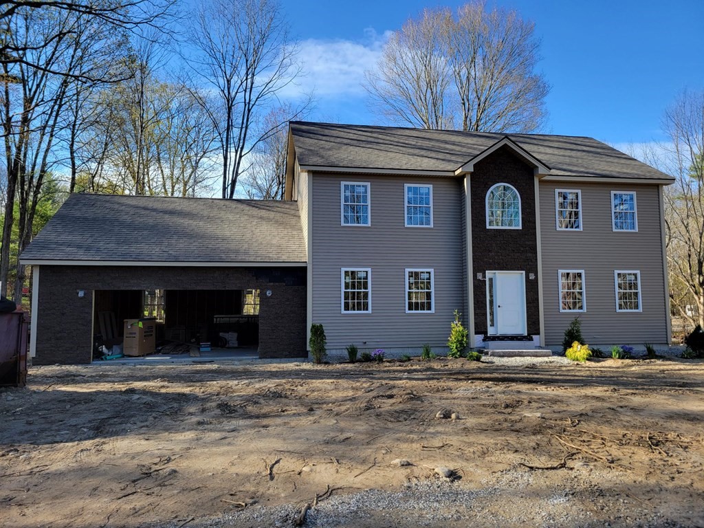 107 Lincoln Road Phillipston, MA 01331 - Photo 1 of 3 a front view of a house with a yard
