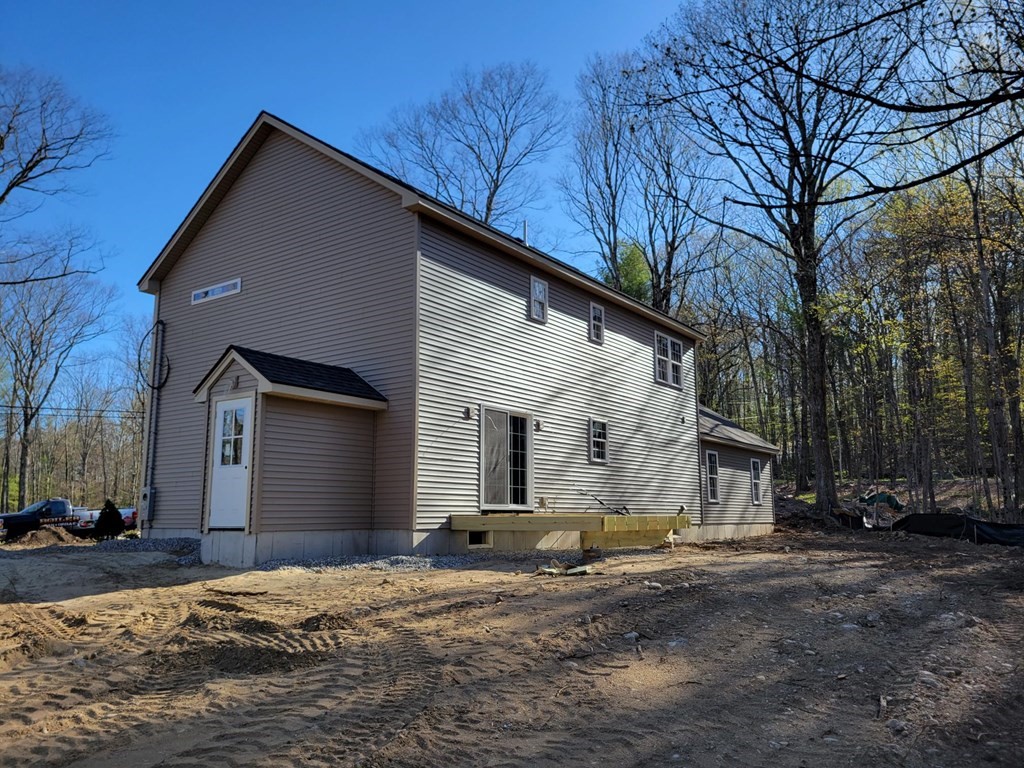 107 Lincoln Road Phillipston, MA 01331 - Photo 2 of 3 a backyard of a house with oven and trees