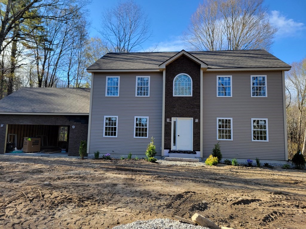 107 Lincoln Road Phillipston, MA 01331 - Photo 3 of 3 a front view of a house with a yard