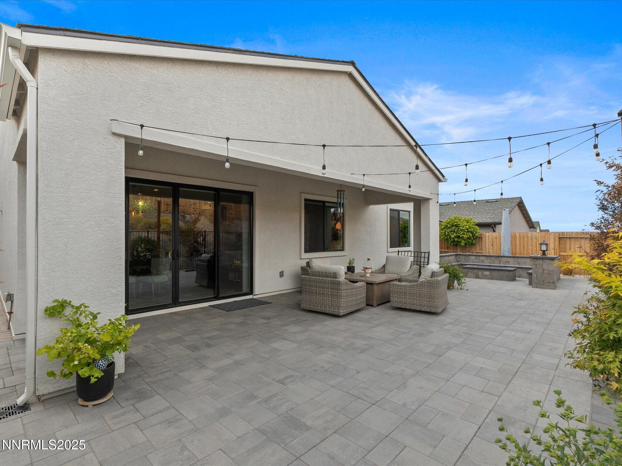 15026 Iron River Drive Reno, NV 89521 - Photo 19 of 26 a view of a patio with couches and a potted plant