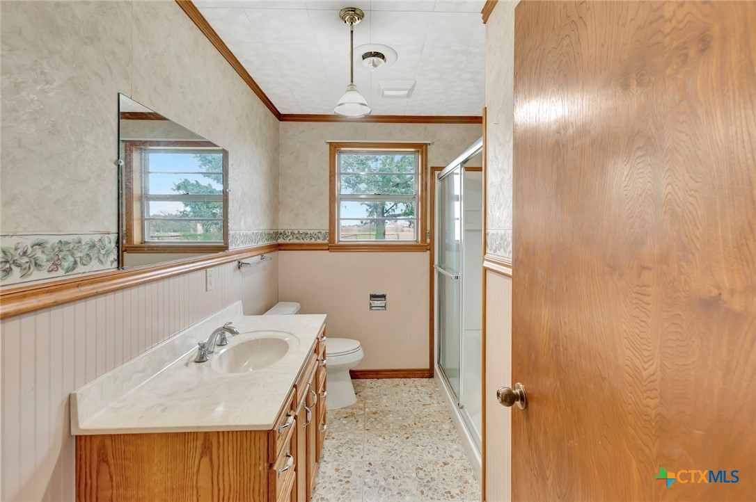1840 Loop 522 Ganado, TX 77962 - Photo 28 of 48 a bathroom with a sink and a window