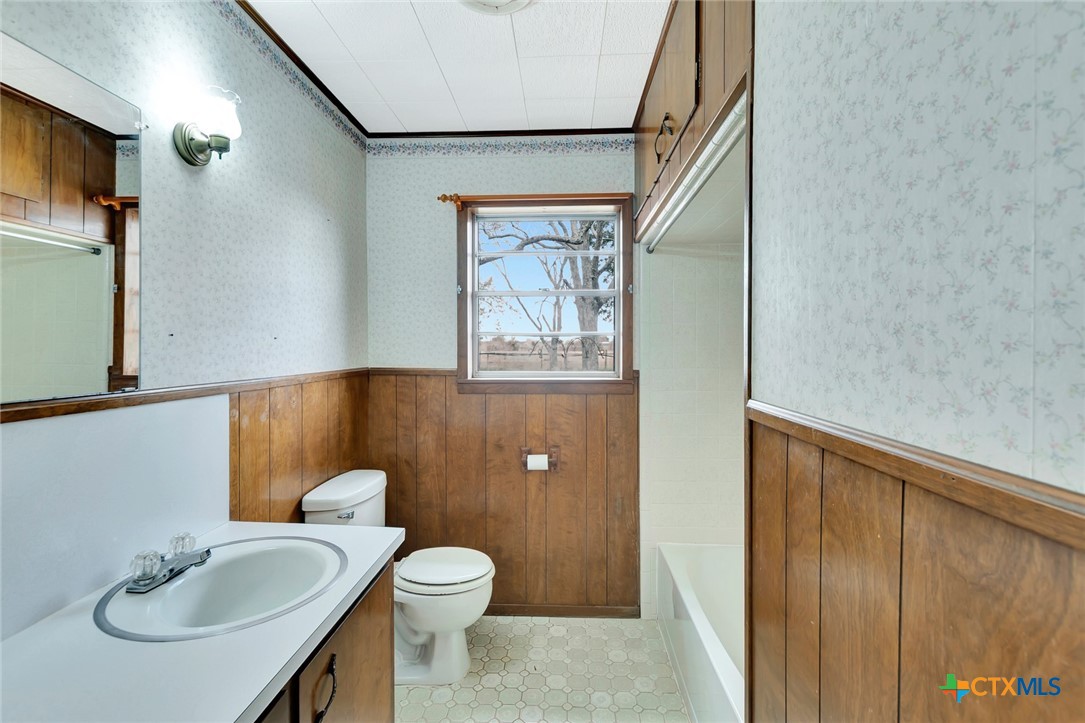 1840 Loop 522 Ganado, TX 77962 - Photo 34 of 48 a bathroom with a sink a toilet and shower