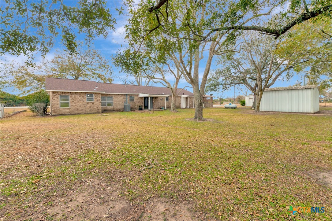 1840 Loop 522 Ganado, TX 77962 - Photo 37 of 48 a view of a house with a yard