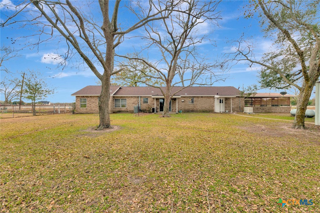 1840 Loop 522 Ganado, TX 77962 - Photo 38 of 48 a view of a house with a yard