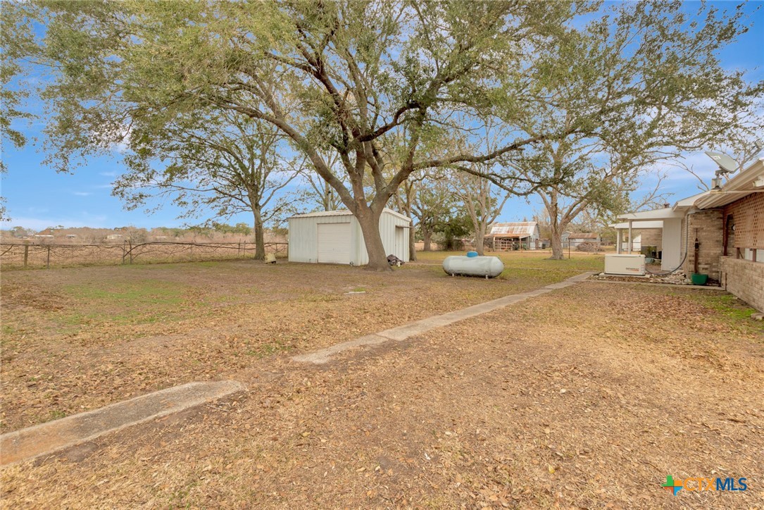 1840 Loop 522 Ganado, TX 77962 - Photo 40 of 48 a view of road with large trees