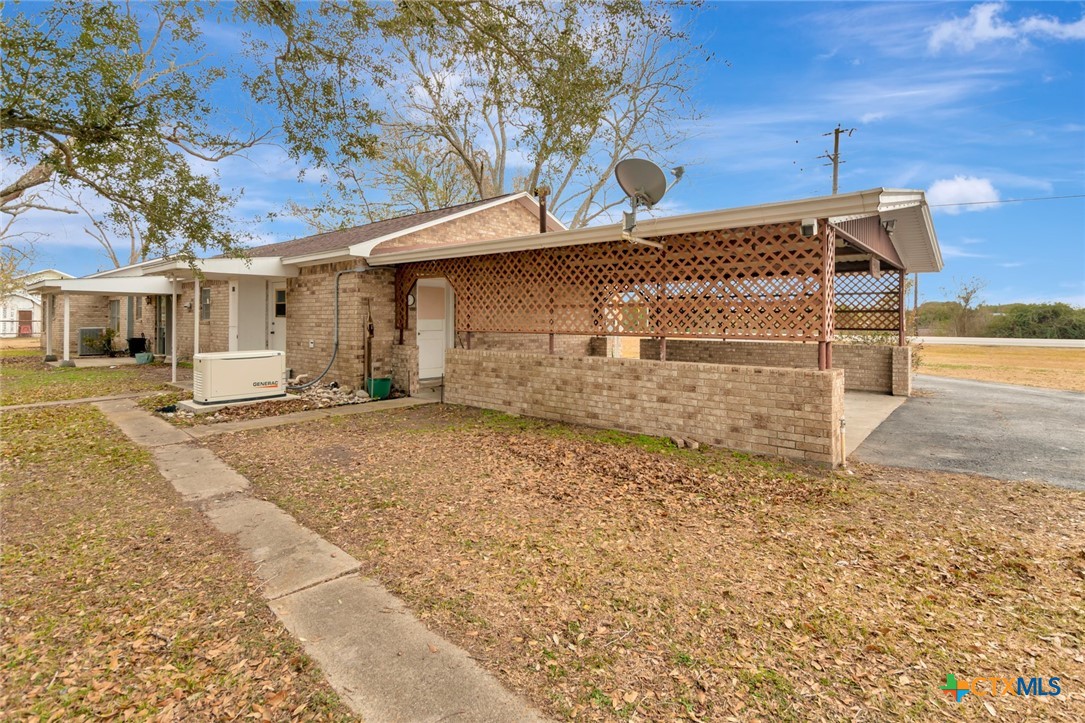 1840 Loop 522 Ganado, TX 77962 - Photo 41 of 48 a view of a house with a yard