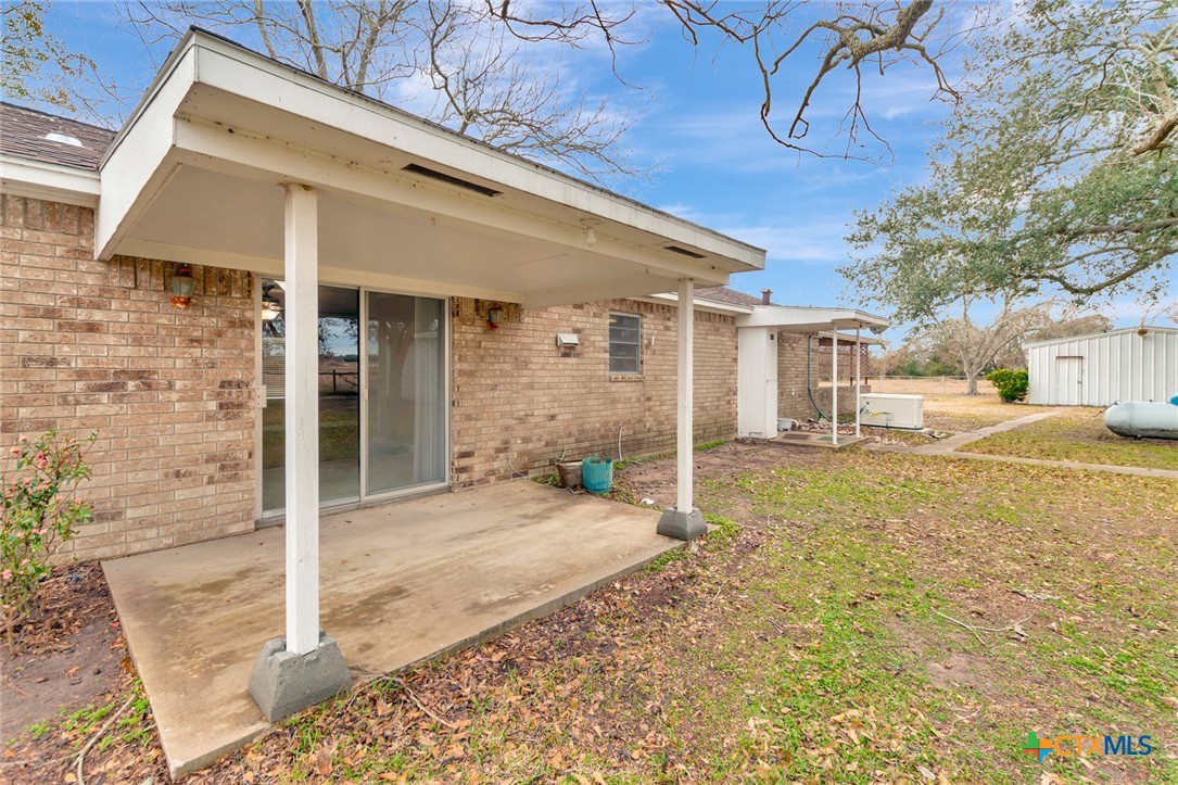 1840 Loop 522 Ganado, TX 77962 - Photo 43 of 48 a view of a house with a backyard