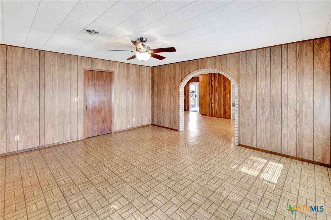 1840 Loop 522 Ganado, TX 77962 - Photo 9 of 48 wooden floor in an empty room with a window