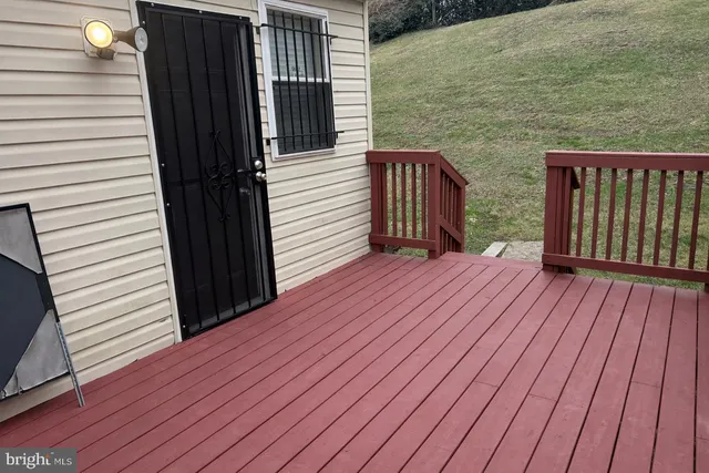 a balcony view with a wooden floor