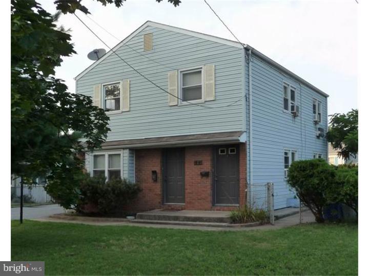 723 South Chester Avenue Riverside, NJ 08075 - Photo 1 of 1 a front view of a house with a garden and plants