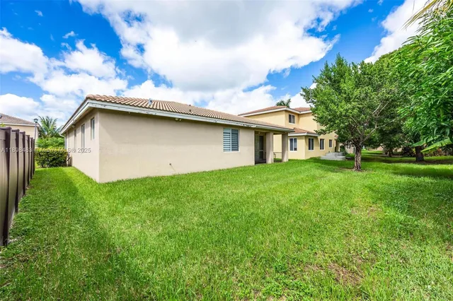 a front view of house with yard