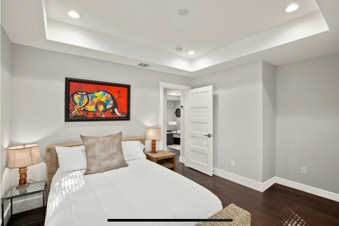 1305 Olander Street Austin, TX 78702 - Photo 12 of 14 a bedroom with bed and a window