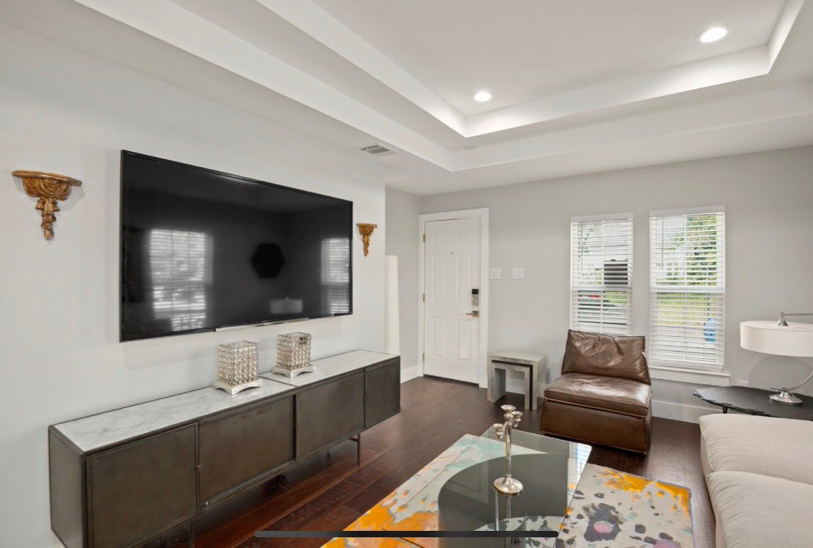 1305 Olander Street Austin, TX 78702 - Photo 4 of 14 a living room with furniture and a flat screen tv