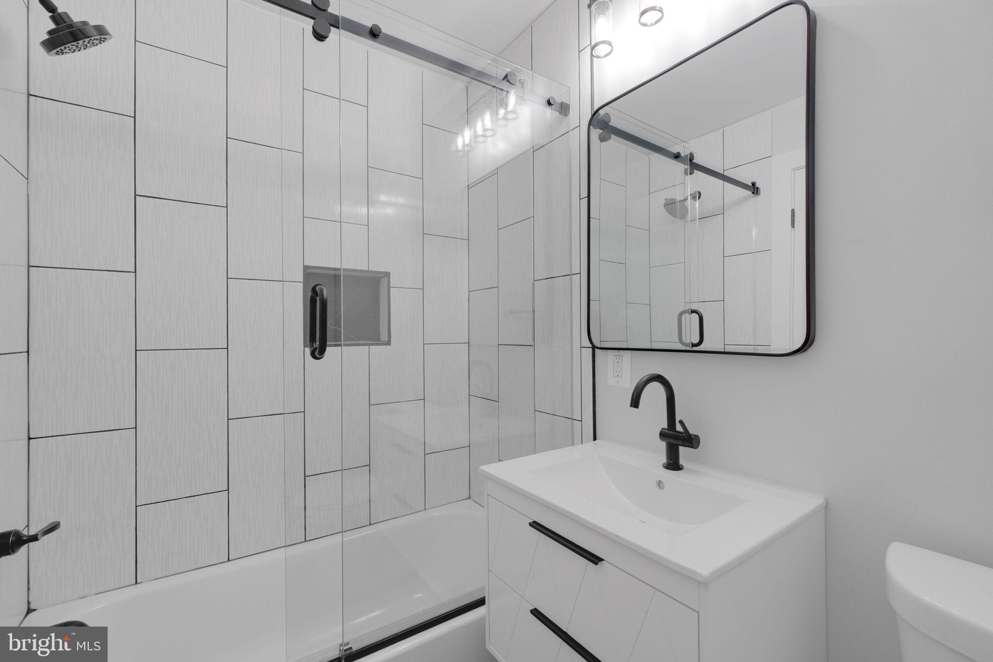 2503 Naylor Road Southeast Washington, DC 20020 - Photo 23 of 31 a bathroom with a sink and mirror