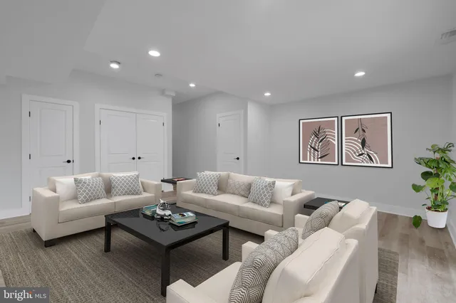 a living room with furniture and a couch