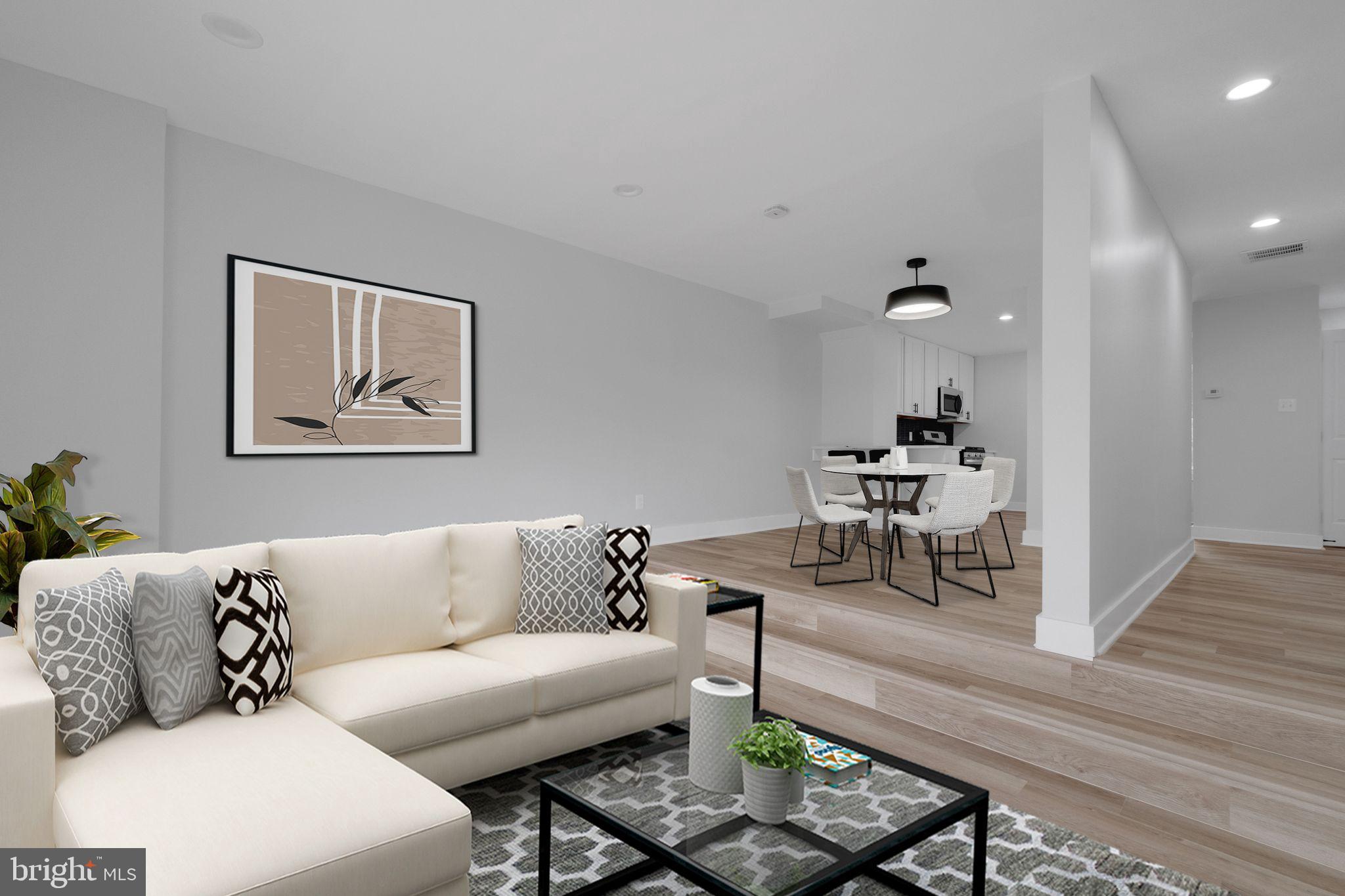 2503 Naylor Road Southeast Washington, DC 20020 - Photo 6 of 31 a living room with furniture and wooden floor