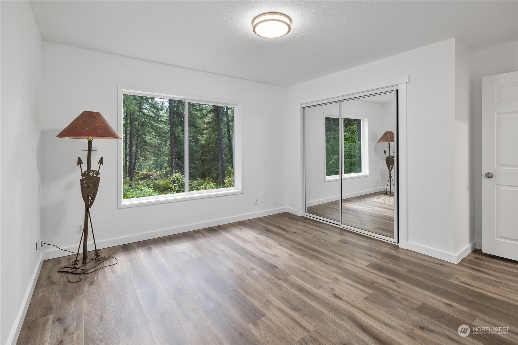 30 Crawford Ronald, WA 98940 - Photo 12 of 30 an empty room with wooden floor and a window