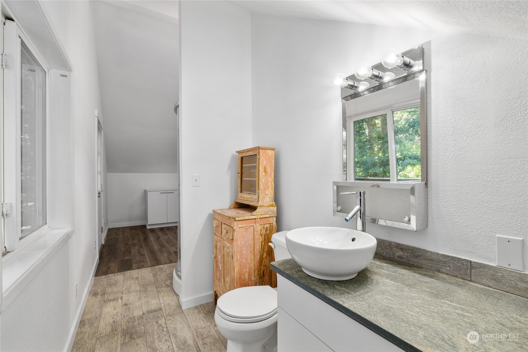 30 Crawford Ronald, WA 98940 - Photo 18 of 30 a bathroom with a granite countertop toilet a sink and a mirror