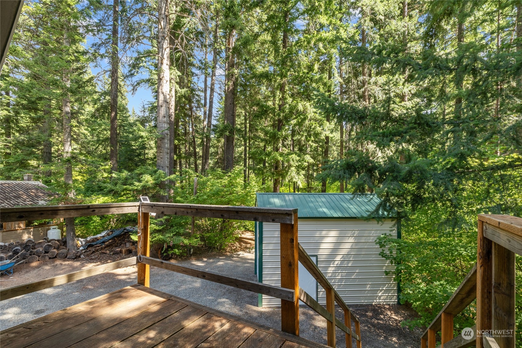 30 Crawford Ronald, WA 98940 - Photo 20 of 30 a view of a wooden deck with a forest