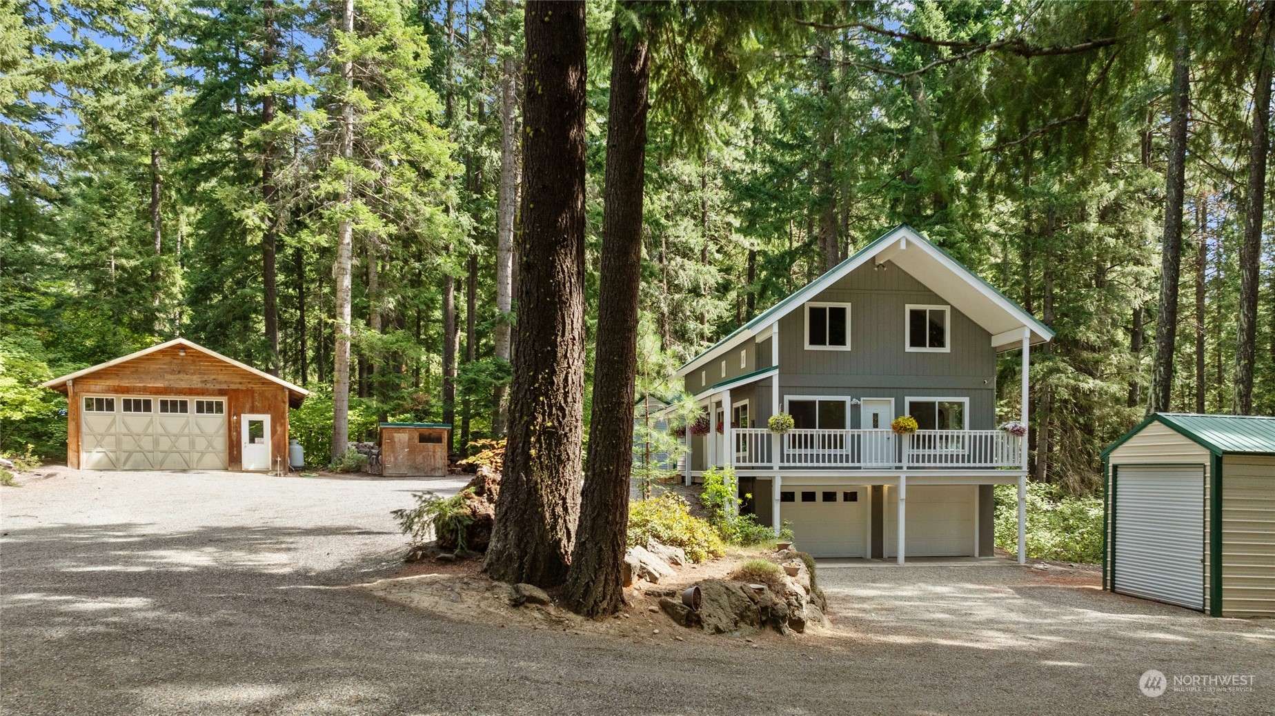 30 Crawford Ronald, WA 98940 - Photo 27 of 30 a front view of a house with a yard and garage
