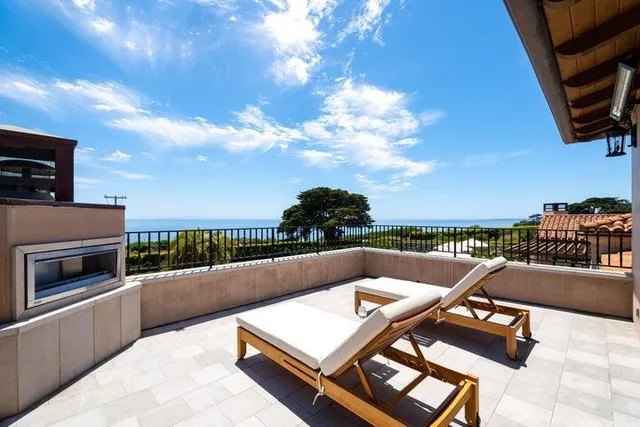a kitchen with sink refrigerator and cabinets