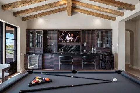 a bedroom with a bed and furniture