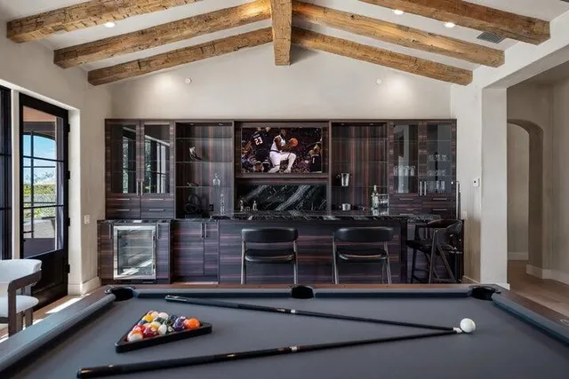 a bedroom with a bed and furniture