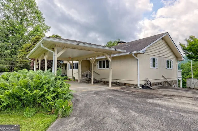 front view of a house with table in front of it