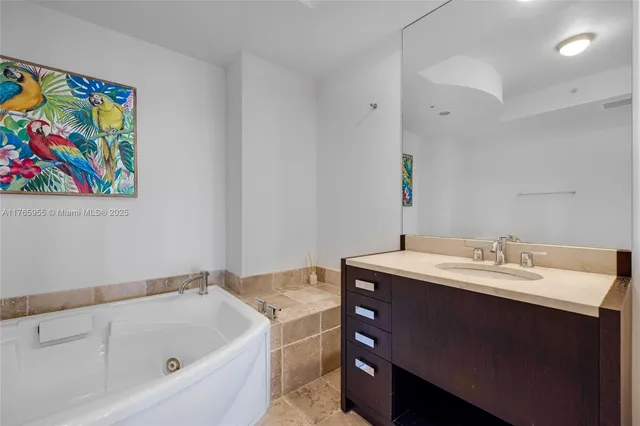 a bathroom with a sink and a bathtub