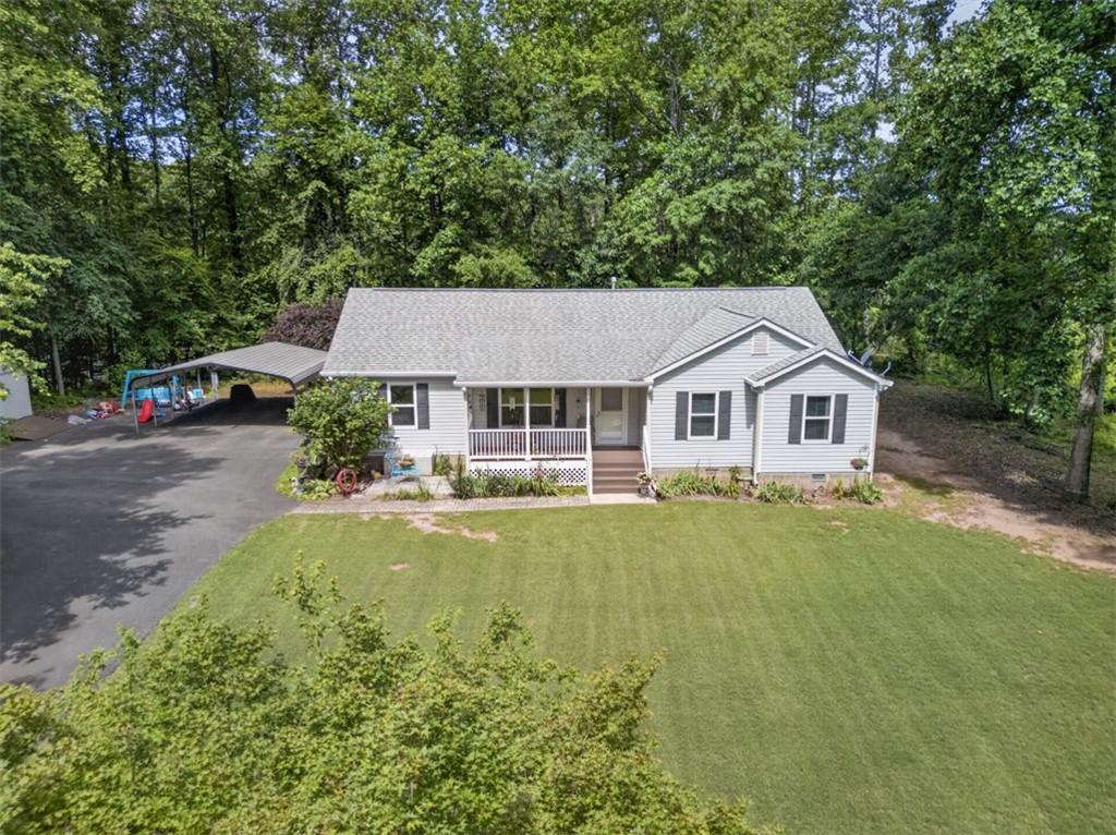 3771 Castleberry Road Cumming, GA 30040 - Photo 59 of 69 a aerial view of a house with swimming pool and sitting area