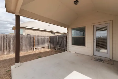 a view of a glass door with a balcony