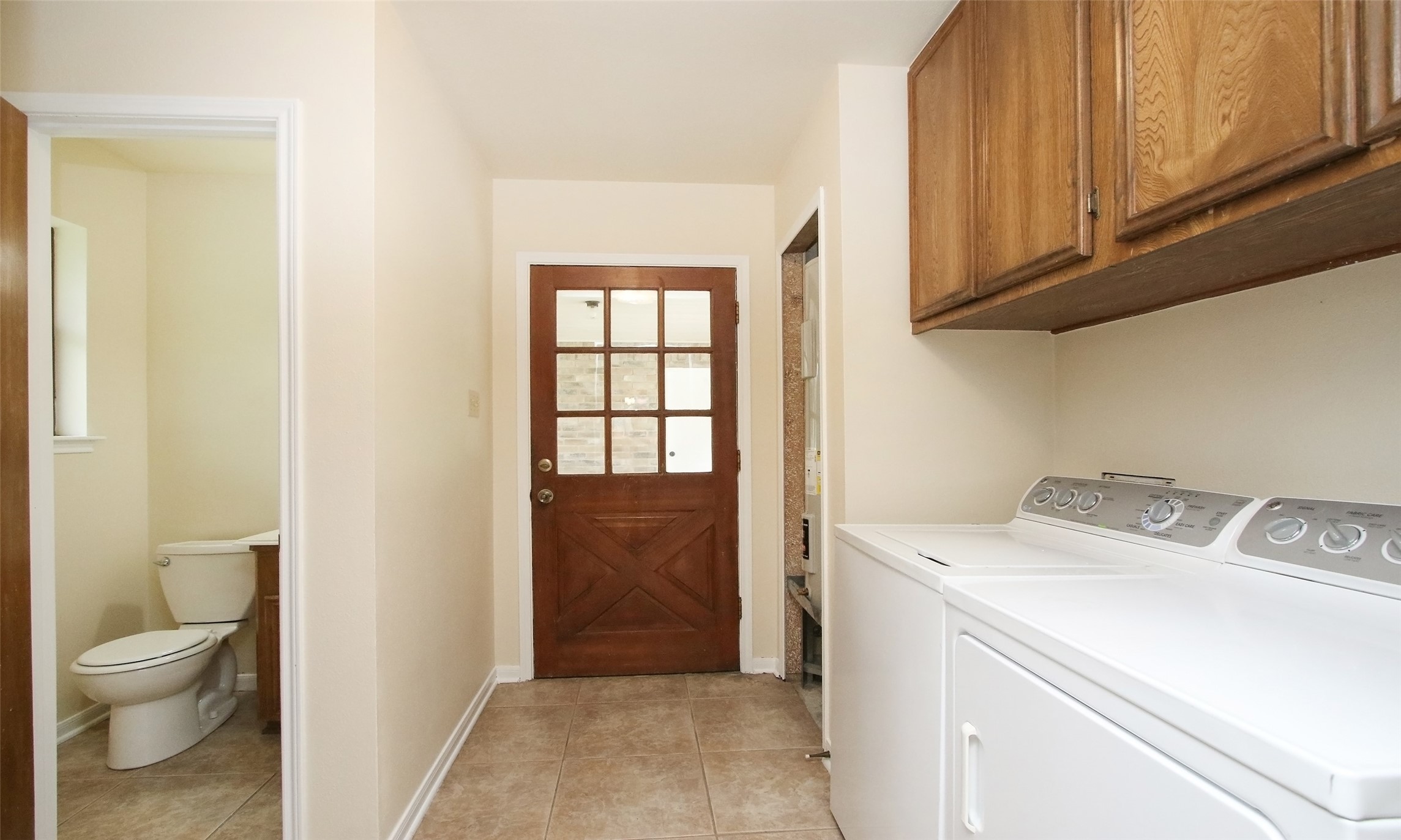 17406 Bobcat Trail Cypress, TX 77429 - Photo 14 of 28 a view of bathroom with a sink and a toilet