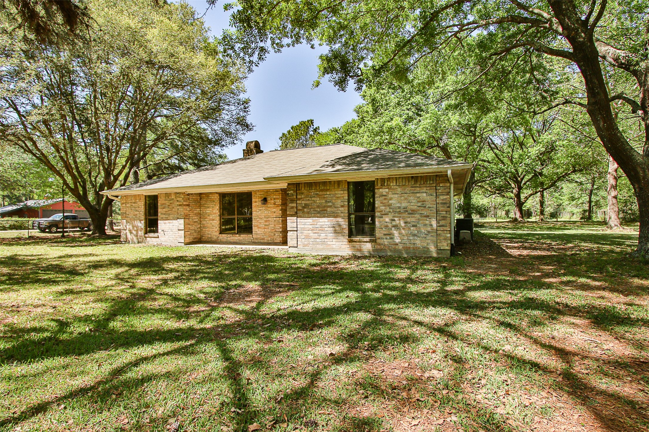 17406 Bobcat Trail Cypress, TX 77429 - Photo 2 of 28 a front view of a house with a garden