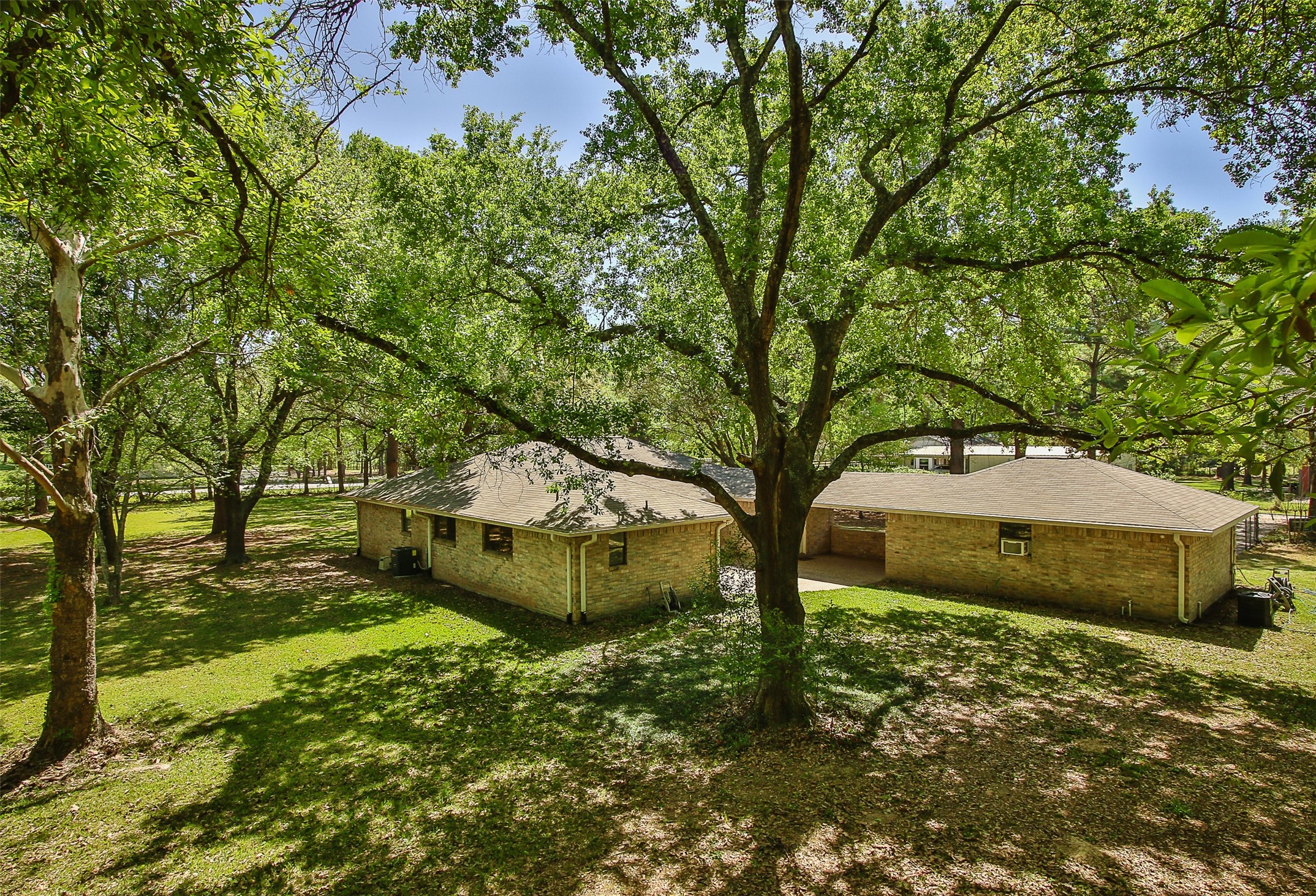 17406 Bobcat Trail Cypress, TX 77429 - Photo 27 of 28 a front view of a house with a yard