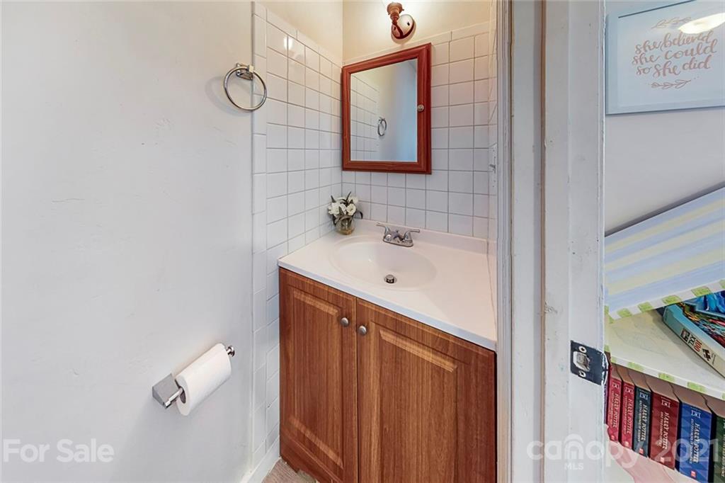 612 Ginger Cake Road Lancaster, SC 29720 - Photo 18 of 35 a bathroom with a sink and a mirror