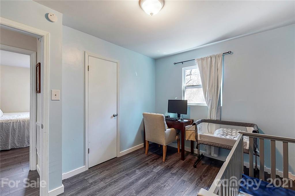 612 Ginger Cake Road Lancaster, SC 29720 - Photo 23 of 35 a workspace with furniture and wooden floor