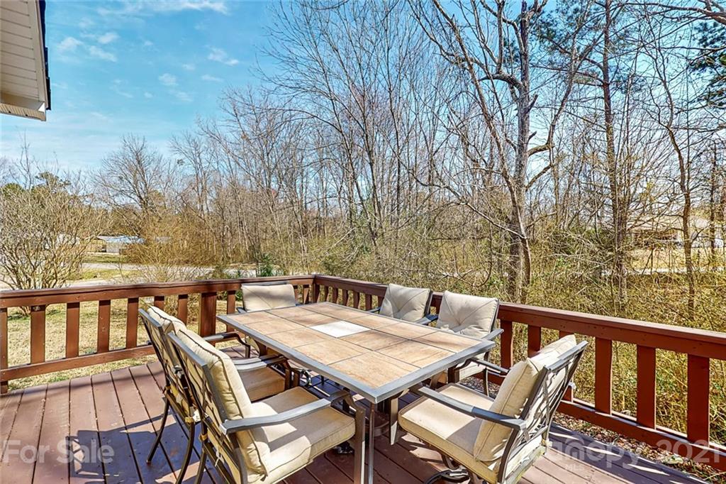 612 Ginger Cake Road Lancaster, SC 29720 - Photo 29 of 35 a view of a patio with a table and chairs