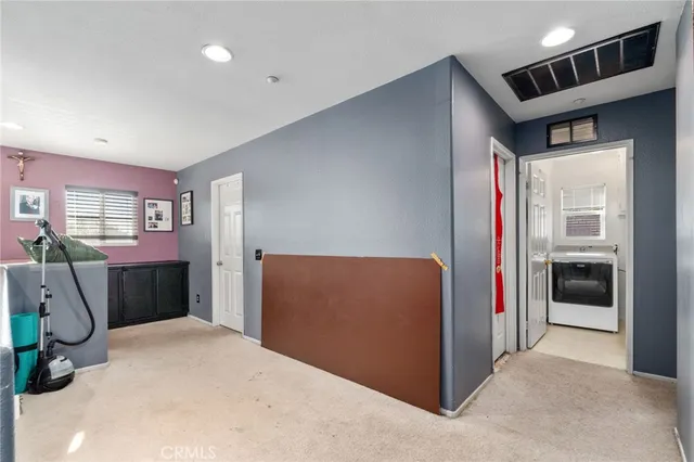 a view of livingroom with furniture and closet