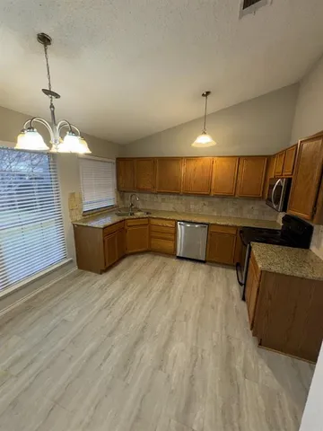 a room with furniture and window