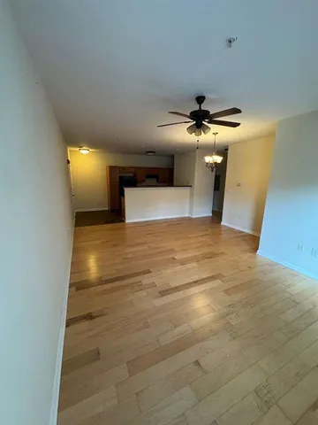 a view of a livingroom with a ceiling fan