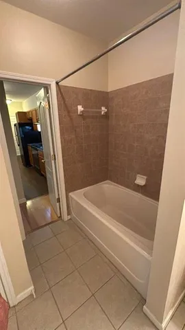 a bathroom with a bathtub