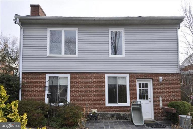 512 Harding Drive Silver Spring, MD 20901 - Photo 2 of 28 a front view of a house with glass windows