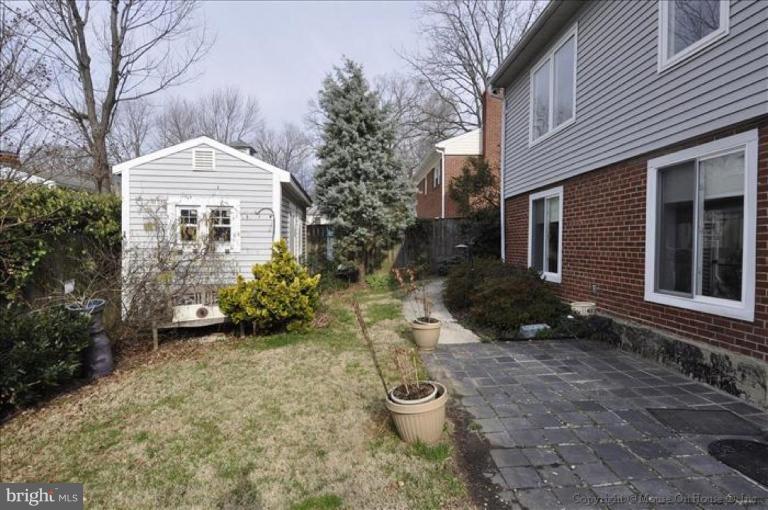 512 Harding Drive Silver Spring, MD 20901 - Photo 18 of 28 a front view of a house with garden
