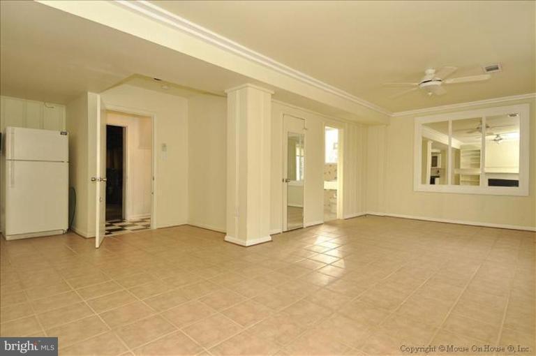 512 Harding Drive Silver Spring, MD 20901 - Photo 24 of 28 a view of an empty room with a fireplace