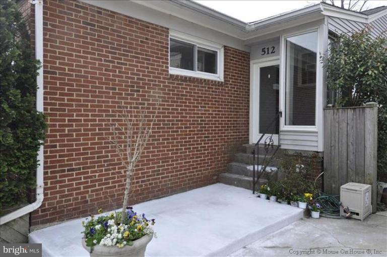 512 Harding Drive Silver Spring, MD 20901 - Photo 27 of 28 a brick building with a sink and a potted plant