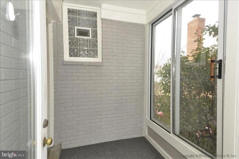 512 Harding Drive Silver Spring, MD 20901 - Photo 5 of 28 a view of a bathroom with a glass door