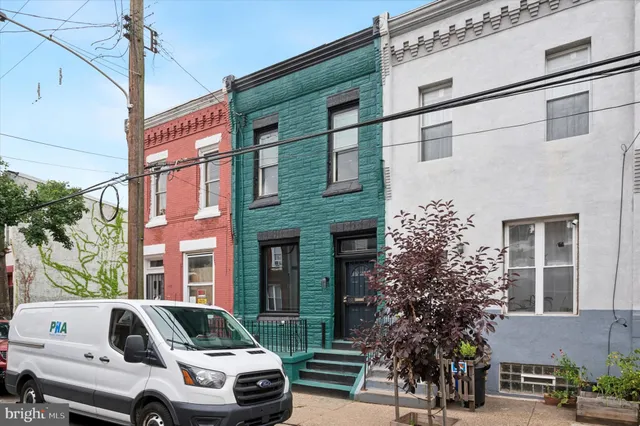 a car parked in front of a building
