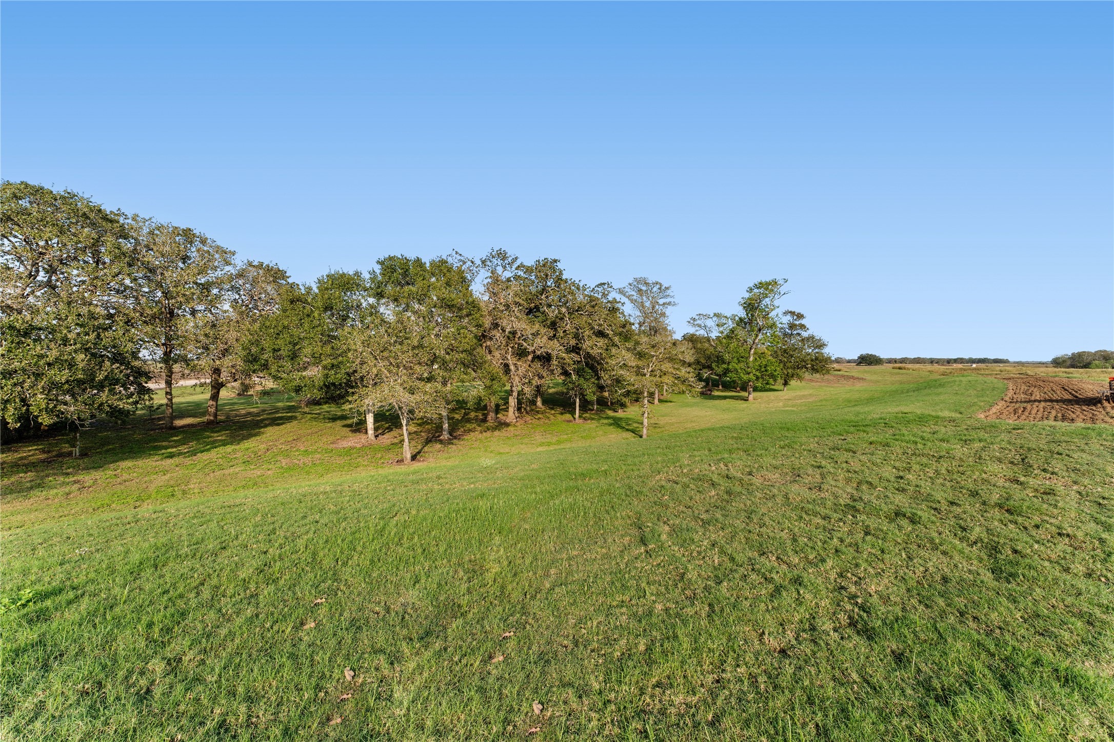 5621 Boothline Road Richmond, TX 77469 - Photo 16 of 26 a view of a field with an ocean