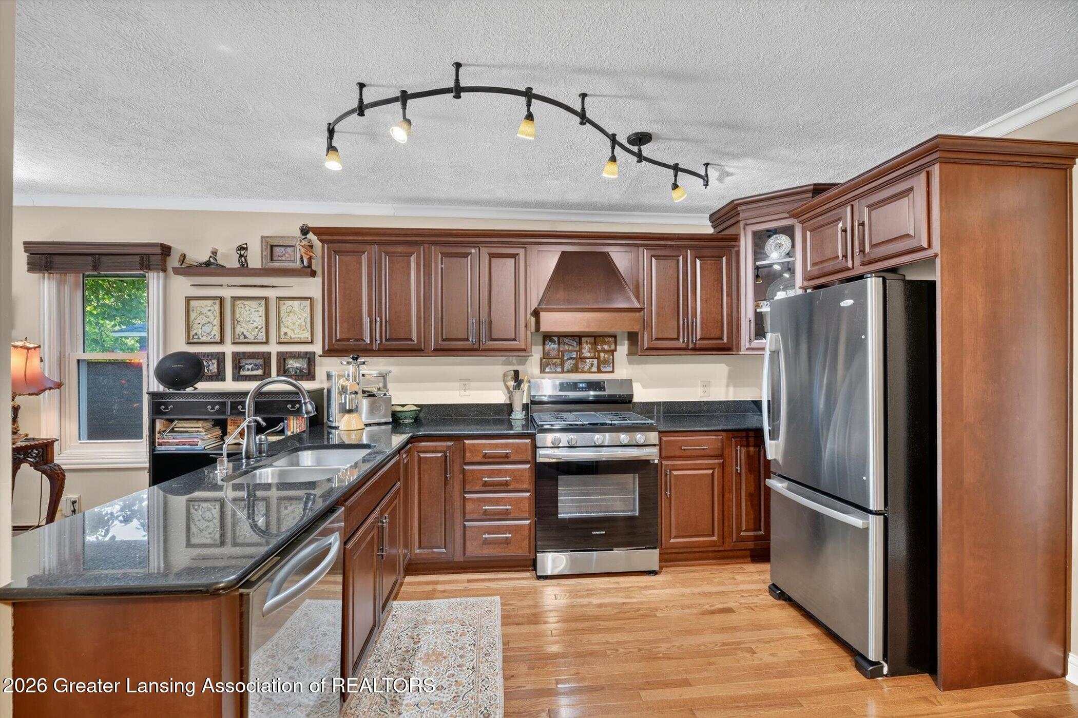 6227 West Reynolds Road Haslett, MI 48840 - Photo 21 of 92 20-6227-W-Reynolds-Rd-WindowStill-Photog