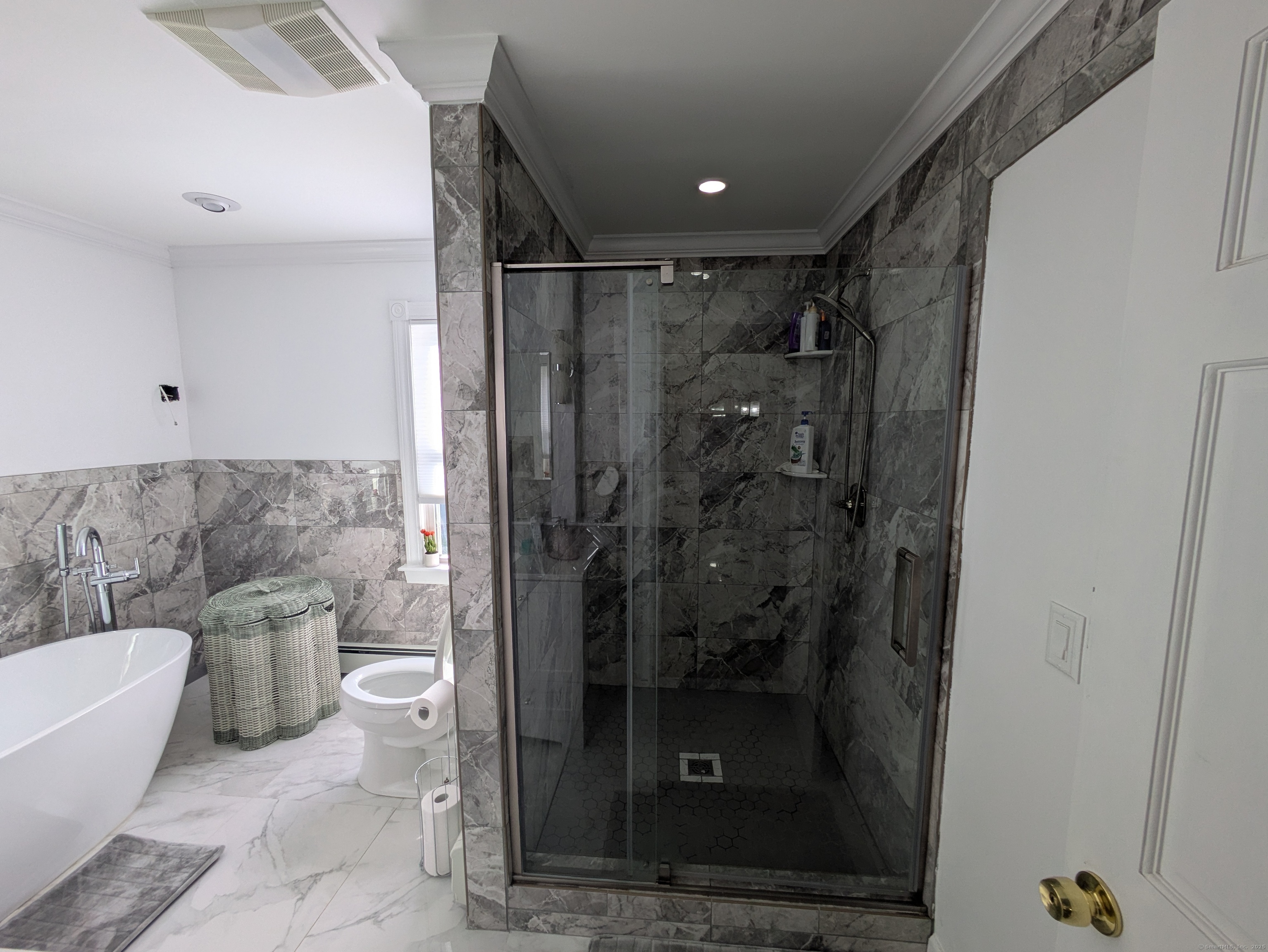 541 Benson Road Middlebury, CT 06762 - Photo 12 of 24 a bathroom with a shower and a sink